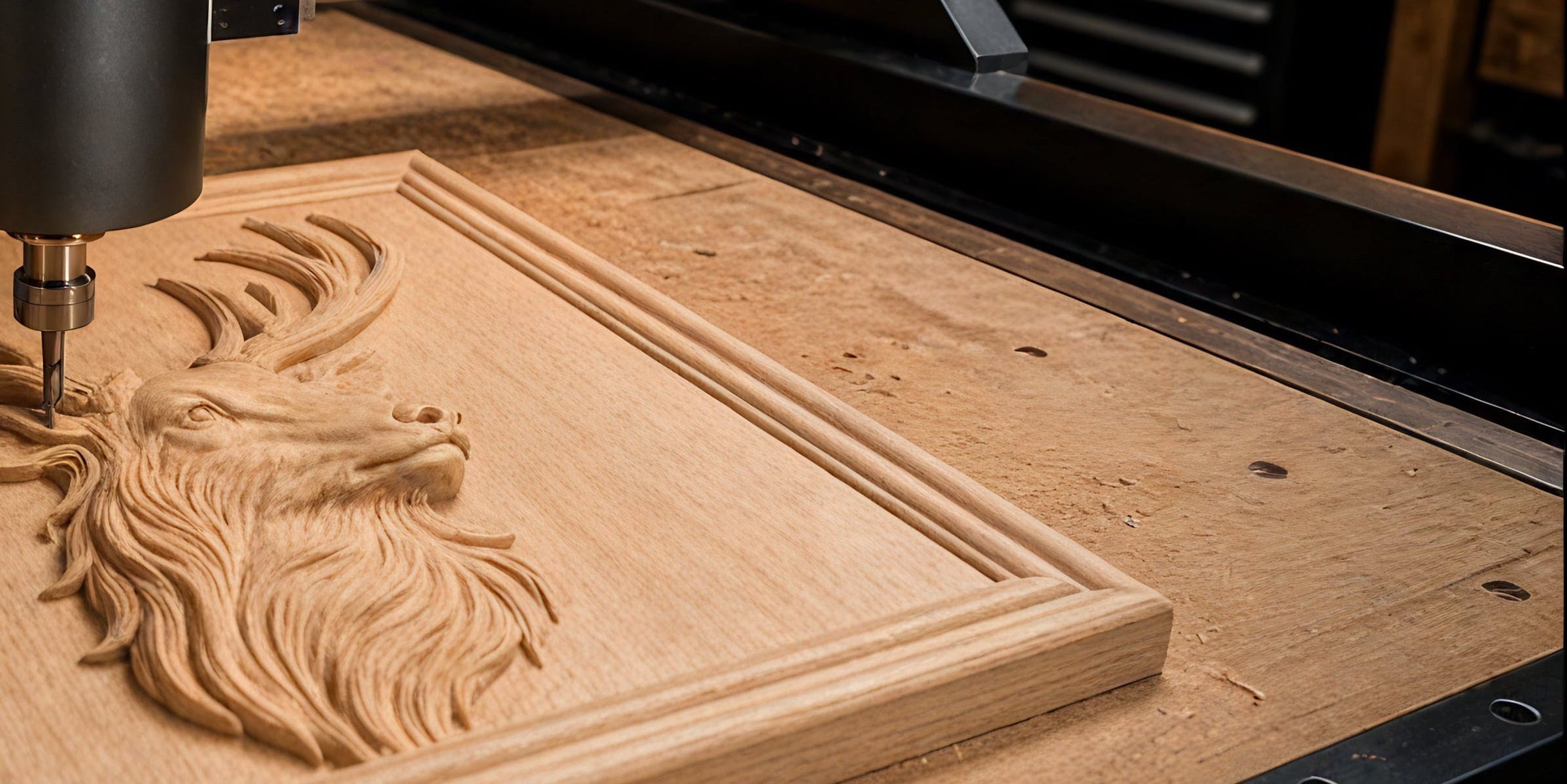 A CNC machine performs a precise relief cut of a stag's head with antlers into a rectangular wooden plaque, using an STL file on a worktable.