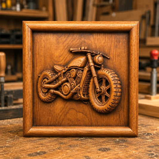A CNC relief carving of a Vintage Bobber Motorcycle, created from the “Vintage Bobber Motorcycle Relief STL File | CNC Garage Wall Art” by Form Arcade, displayed upright on a wooden workbench in a workshop setting.