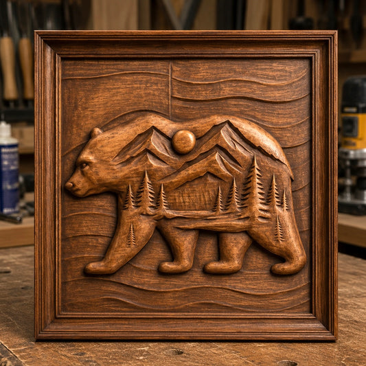 The Mountain Bear Landscape Relief STL File by Form Arcade, a wildlife CNC wall art design featuring a bear with intricately engraved mountains, trees, and sun, is framed and displayed on a workbench in a woodshop—showcasing detailed woodworking and modern CNC relief carving techniques.