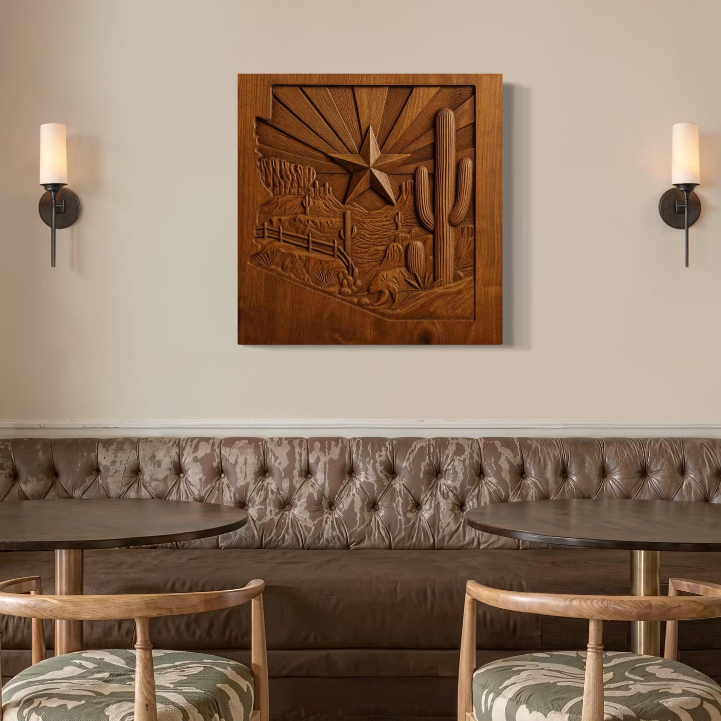 A cozy seating area with a tufted bench, round tables, wooden chairs, wall sconces, and Form Arcade’s Arizona Desert Star CNC Relief STL File—Southwest Cactus CNC Wall Art—adds a carved desert charm.